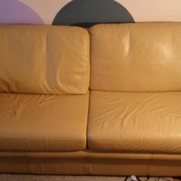 gelbe Leder Couch zu verschenken